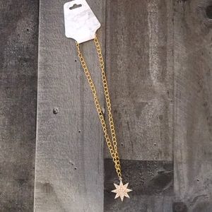 Gold tone 8 sided star necklace